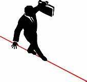 Man balancing on tightrope